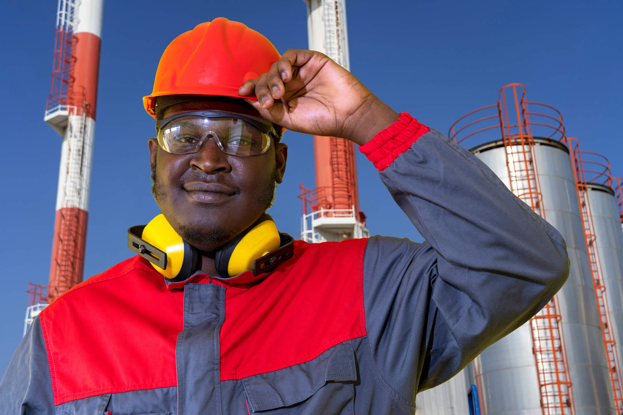 Why is flame-resistant clothing important in the oil and gas industry?