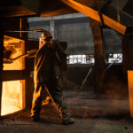 Steel worker near furnace